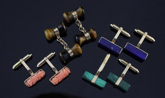 Four pairs of cufflinks.